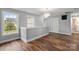 Bright upstairs landing area with hardwood floors and natural light from large windows at 3124 Pikes Peak Dr, Gastonia, NC 28052