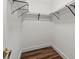 A compact walk-in closet space with hanging rods and shelves at 3124 Pikes Peak Dr, Gastonia, NC 28052