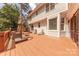 Expansive wooden deck with outdoor seating offers picturesque views of the surrounding landscape at 3318 Providence Hills Dr, Matthews, NC 28105