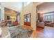 Elegant foyer showcasing hardwood floors, access to multiple living spaces, and high ceilings at 3318 Providence Hills Dr, Matthews, NC 28105