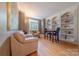 Cozy living room with built-in bookshelves and comfortable seating area at 3318 Providence Hills Dr, Matthews, NC 28105