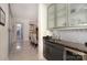 Bar area featuring modern cabinetry, a sleek sink, and beverage storage, perfect for entertaining at 333 W Trade St # 1304, Charlotte, NC 28202