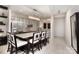 Modern kitchen featuring a center island with seating, stainless steel appliances, and a stunning chandelier at 333 W Trade St # 1304, Charlotte, NC 28202