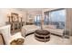 Elegant living room with comfortable seating, stylish furniture, and large windows for natural light at 333 W Trade St # 1304, Charlotte, NC 28202