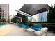 Rooftop pool deck with lounge seating and city views at 333 W Trade St # 1304, Charlotte, NC 28202