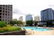 Rooftop pool with lounge chairs and city views at 333 W Trade St # 1304, Charlotte, NC 28202