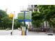 Informative street sign in Uptown West highlights nearby parks and transportation options at 333 W Trade St # 1304, Charlotte, NC 28202