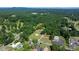 An overhead view reveals residences, commercial buildings, green fields, and roads in a community at 3423 S Hwy 127 Hwy, Hickory, NC 28602