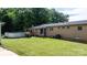 Back exterior with brick siding, large yard, and above ground pool at 3423 S Hwy 127 Hwy, Hickory, NC 28602