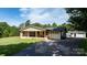 Charming brick home with a covered front porch, a well-maintained lawn, and a paved driveway at 3423 S Hwy 127 Hwy, Hickory, NC 28602