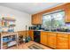Well-lit kitchen featuring wooden cabinets, essential appliances, and an inviting atmosphere at 3423 S Hwy 127 Hwy, Hickory, NC 28602