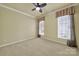 This bedroom includes neutral paint and carpet and two large windows at 35115 Carnation Ln, Fort Mill, SC 29707