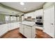 Bright kitchen featuring an island, stainless appliances, and ample cabinet space at 35115 Carnation Ln, Fort Mill, SC 29707