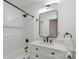 Modern bathroom with shower and tub and white vanity with countertop at 3900 Colebrook Rd, Charlotte, NC 28215
