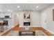 Stylish living room with a marble fireplace, hardwood floors, and plenty of natural light at 3900 Colebrook Rd, Charlotte, NC 28215