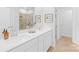 Modern bathroom with double vanity, white quartz countertops, and stylish fixtures at 3938 Isenhour Rd, Kannapolis, NC 28081