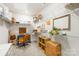 Spacious walk-in closet featuring wire shelving, storage, and a small workstation area for convenient organization at 3938 Isenhour Rd, Kannapolis, NC 28081