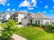 Beautiful single-Gathering home featuring manicured lawn, stone accents, and a two-car garage on a sunny day at 3938 Isenhour Rd, Kannapolis, NC 28081