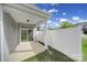 Covered patio with sliding glass door, offering an inviting outdoor living space at 4003 Rothwood Ln, Harrisburg, NC 28075