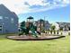 Community playground providing a fun and safe recreational area for children, surrounded by well-maintained landscaping at 4003 Rothwood Ln, Harrisburg, NC 28075
