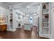 A modern kitchen features a center island with pendant lighting and stainless steel appliances at 413 E Worthington Ave, Charlotte, NC 28203