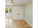 Bright bedroom featuring hardwood floors, neutral paint, a ceiling fan and a bay window at 449 Windward Dr, Davidson, NC 28036