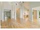Open-concept space with hardwood floors, high ceilings, and seamless flow to the kitchen and outdoor deck at 449 Windward Dr, Davidson, NC 28036
