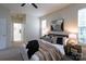 Cozy main bedroom featuring neutral colors, carpet floors, and windows for natural light at 4637 Willow Glen Rd, Harrisburg, NC 28075