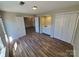 Finished basement with vinyl floors and a wet bar, creating a perfect space for entertaining at 5003 Sharon Rd # Q, Charlotte, NC 28210