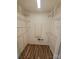 Walk-in closet featuring wire shelving and wood-look flooring at 5003 Sharon Rd # Q, Charlotte, NC 28210