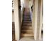 Exterior wooden staircase with white railings leading to upper level units, offering a welcoming entrance at 5003 Sharon Rd # Q, Charlotte, NC 28210