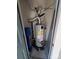 Close up view of the hot water heater in a utility closet at 5003 Sharon Rd # Q, Charlotte, NC 28210