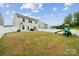Large backyard with a playset, offering plenty of space for outdoor activities at 5113 Saddleback Dr, Mount Holly, NC 28120