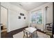 bedroom with hardwood floors, natural light, and a modern, neutral-colored rug at 5113 Saddleback Dr, Mount Holly, NC 28120