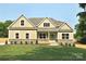 Charming home boasts a manicured lawn, stone accents, and a welcoming light blue front door at 5408 Unionville Brief Rd, Unionville, NC 28110