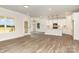 Bright open concept living space combines the living and dining areas, and a modern kitchen at 5408 Unionville Brief Rd, Unionville, NC 28110