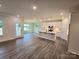 Bright open concept living space combines the living and dining areas, and a modern kitchen at 5408 Unionville Brief Rd, Unionville, NC 28110