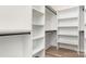 Organized walk-in closet with ample shelving and modern fixtures provides efficient storage solutions at 5408 Unionville Brief Rd, Unionville, NC 28110