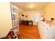Upstairs bedroom featuring hardwood floors, white trim, a large closet, and natural lighting at 616 N Deal Ave, Newton, NC 28658