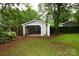 Exterior view of a one car detached storage shed in a home's backyard at 616 N Deal Ave, Newton, NC 28658