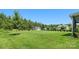 Lush backyard with a shed, bordered by trees and landscaping, extending to the property line at 6535 Bridgemoor Dr, Indian Trail, NC 28079