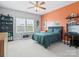 Bright bedroom with two-tone paint, ceiling fan, large window and ample decor shelving at 6535 Bridgemoor Dr, Indian Trail, NC 28079