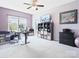 Spacious office with dual windows, ceiling fan, desk, storage and an area to watch TV at 6535 Bridgemoor Dr, Indian Trail, NC 28079