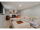 Finished basement with fireplace and neutral furnishings at 7018 Rollingridge Dr, Charlotte, NC 28211