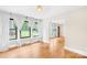 Bright living room featuring hardwood floors, white trim, and natural light at 7022 Lakeside Dr, Charlotte, NC 28215