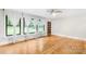 Bright living room featuring hardwood floors, white trim, and natural light at 7022 Lakeside Dr, Charlotte, NC 28215