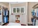 Walk-in closet with custom shelving and drawers for optimal organization and storage at 8070 Clems Branch Rd, Indian Land, SC 29707
