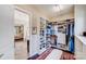 Organized closet with built-in shelves and hanging racks for clothing and accessories, plus a large mirror at 8070 Clems Branch Rd, Indian Land, SC 29707