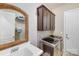 Efficient laundry room with modern washer and dryer, ample storage, and sink at 8070 Clems Branch Rd, Indian Land, SC 29707