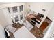 Spacious living room with high ceilings, large windows and modern furniture at 8256 Chatham Oaks Dr, Concord, NC 28027